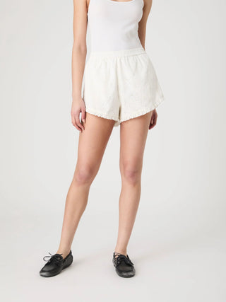 Eyelet Ruffle Hem Shorts - obligato