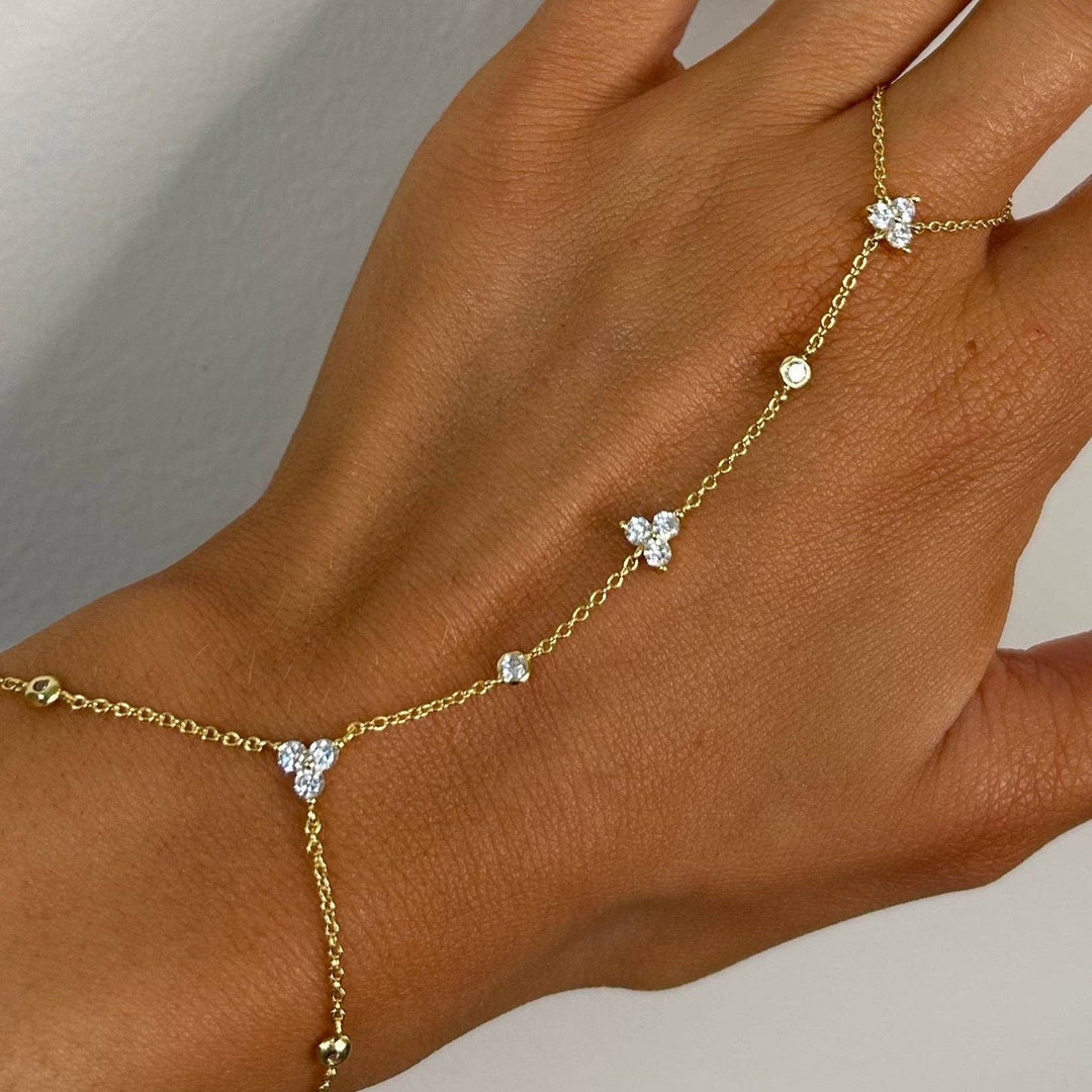 Kira Hand Chain Bracelet in Gold