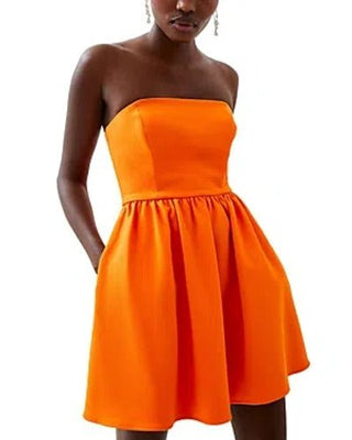 Whisper Strappless Peplum Dress in Orange - obligato